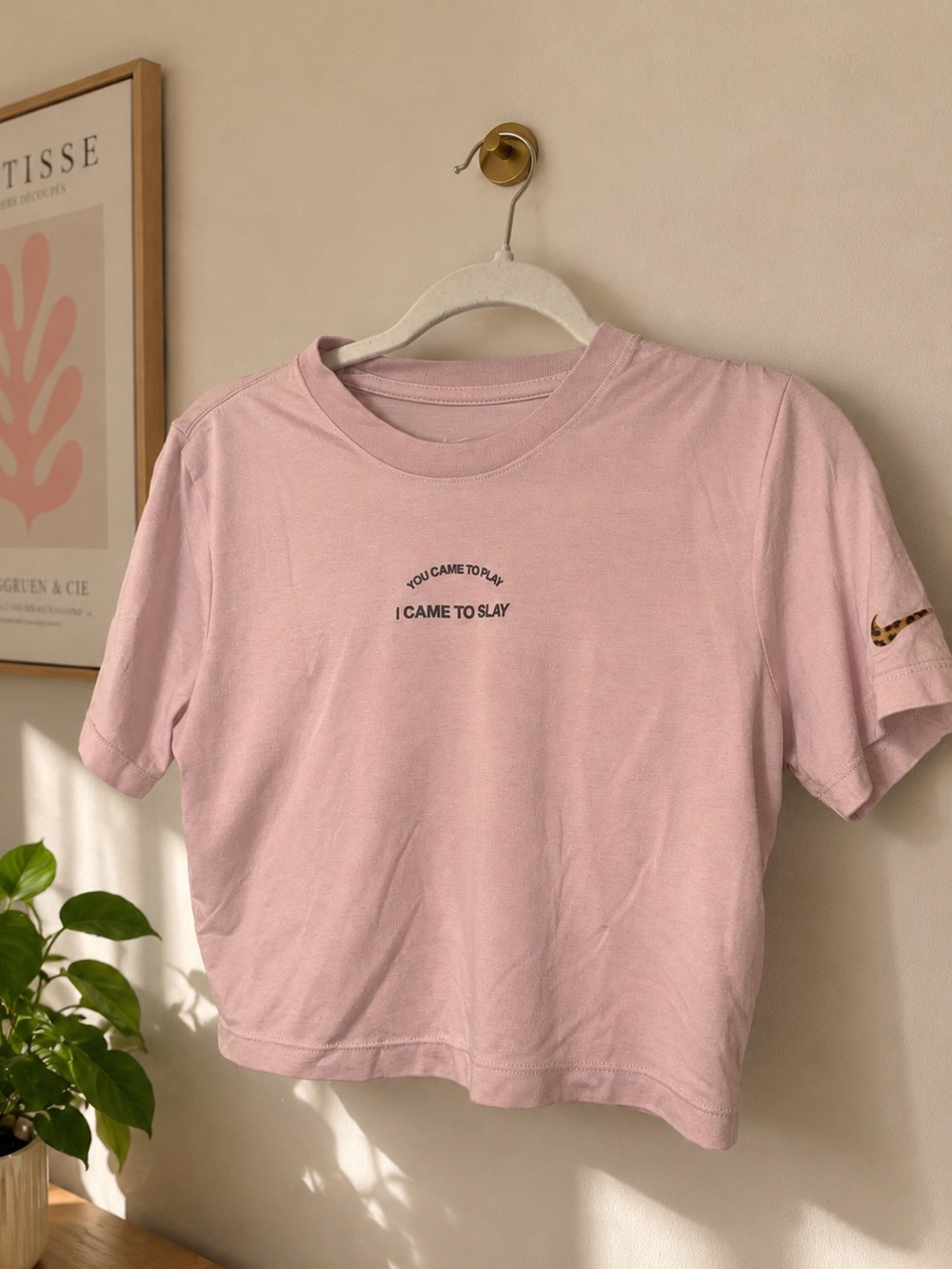 Nike Light Pink Cropped Tee with printed Swoosh
